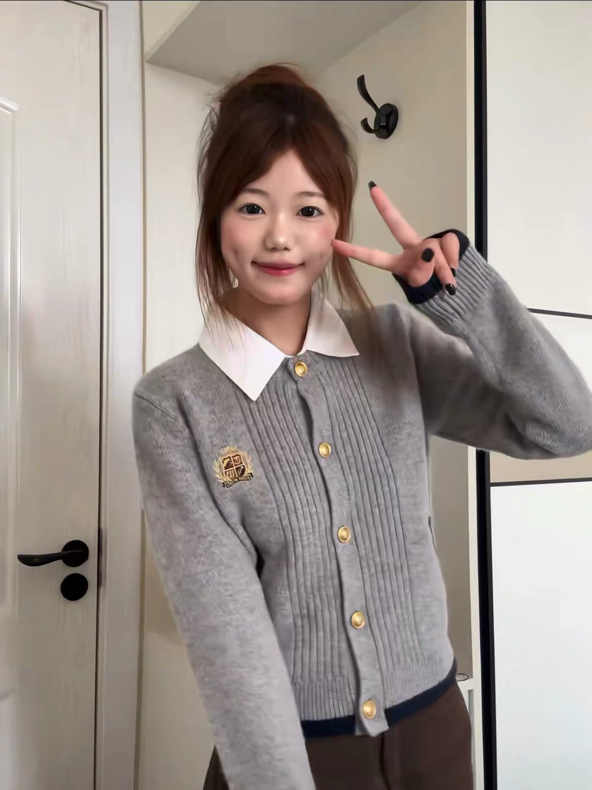 학원 스타일 페이크 레이어드 폴로 칼라 니트 오픈 가디건 여성 2026 가을 새로운 한 부서 느긋한 고급 센스 스웨터 코트 상세 이미지 4