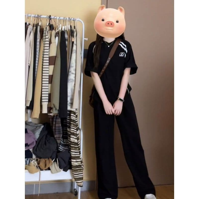 여름 새로운 아메리칸 품격 캐주얼 스포츠 슈트 여성 레트로 패션 검정색 라운드 넥 반팔 긴 바지 투피스 세트 이미지 3