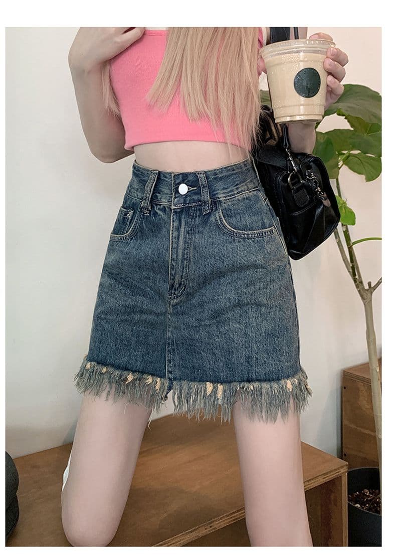 ins 바람 새로운 데님 스커트 여성 반신 패션 레트로 데님 한 마디 타이트 스커트 술 디자인 거친 가장자리 짧은 치마 상세 이미지 4