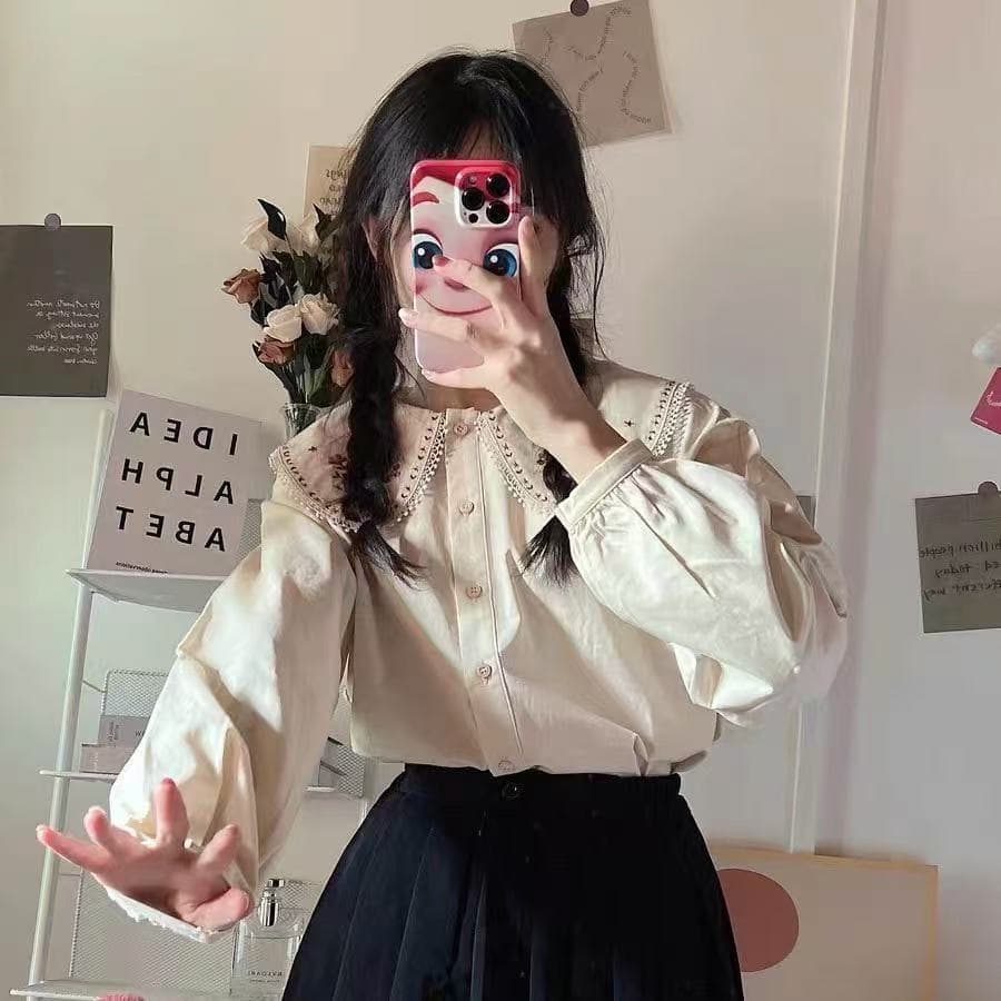 봄 새로운 2026 베이비 칼라 셔츠 긴팔 여성 디자인 센스 작은 대중 루즈핏 셔츠 Chic 달콤함 맨위 트렌디 이미지 2