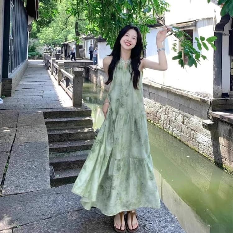 새로운 중식 여성 의류 민소매 행침 목 점프 슈트 치마 여름 감기 느슨함 센스 착용 가져 가라. 슬립 녹색 꽃무늬 롱 스커트
