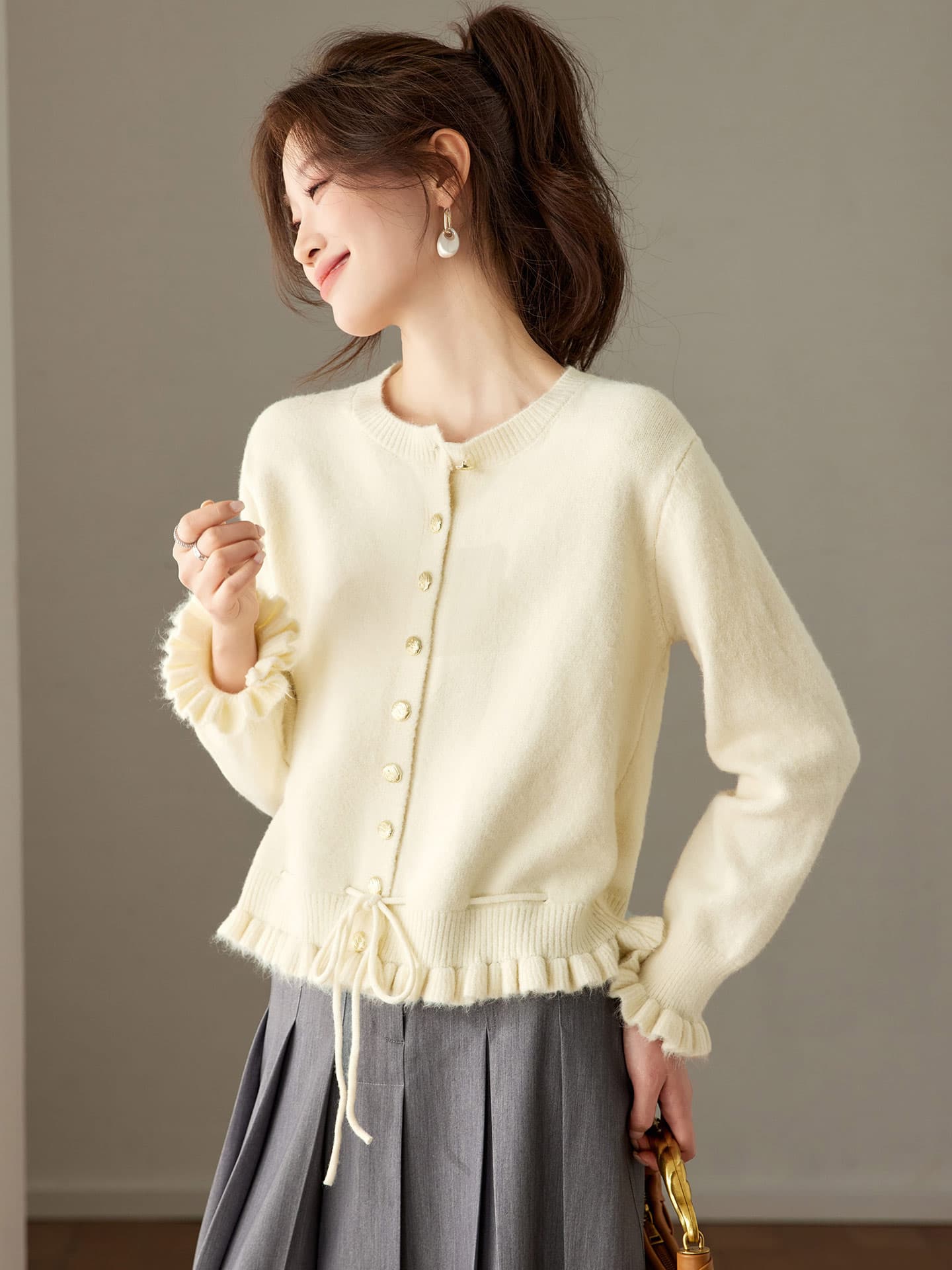 달콤한 스타일 프릴 니트 오픈 가디건 여성 2026 새로운 이른 가을 디자인 센스 라운드 넥 펌프 로프 쇼트 스타일 외부 가져 가라. 스웨터 이미지 4