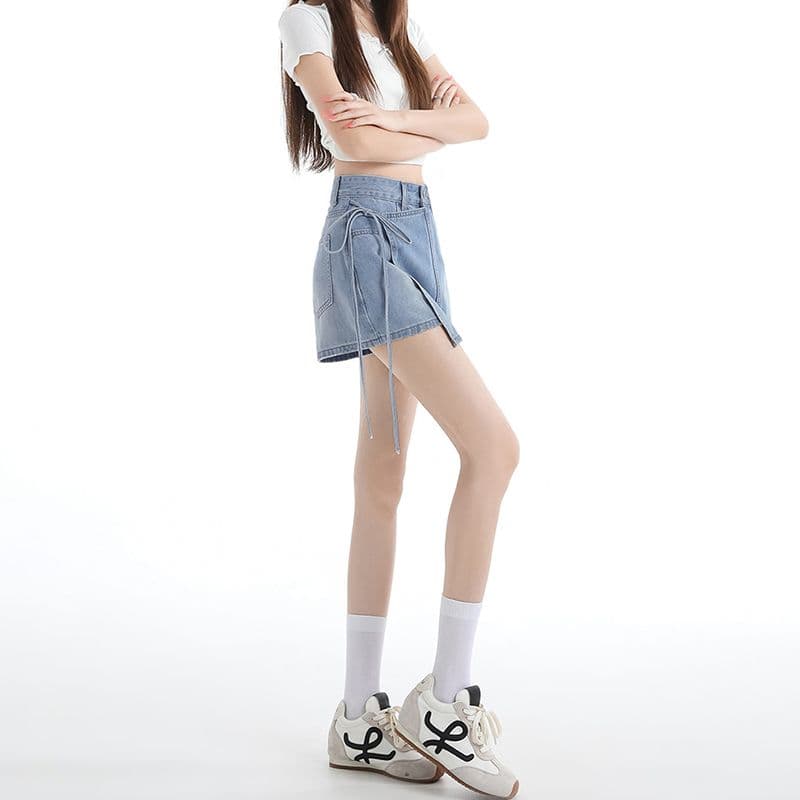 봄 여름 새로운 페이크 레이어드 한 마디 데님 짧은 치마바지 여성 작은 대중 디자인 센스 레이스업 하이웨이스트 데님 치마바지 트렌디 이미지 3