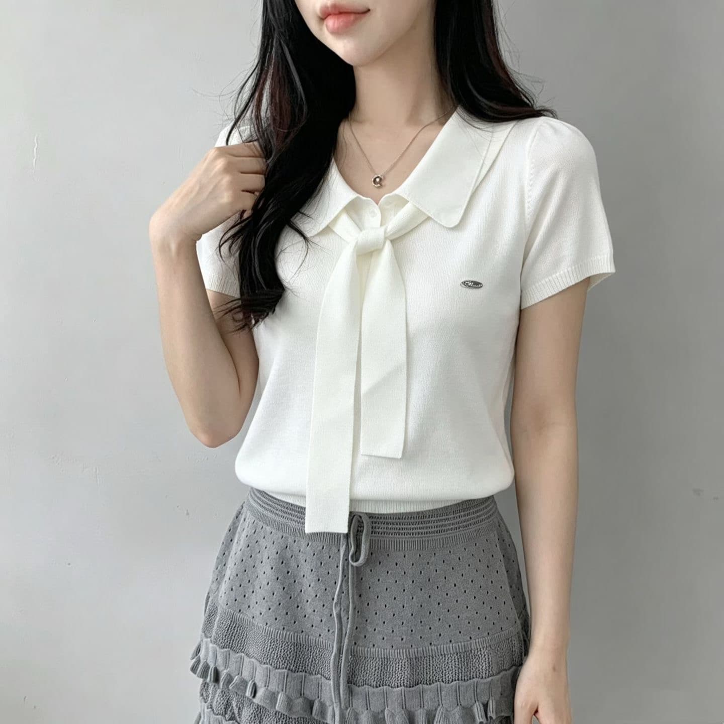 여름 새로운 페이크 레이어드 POLO 칼라 니트 반팔 디자인 센스 작은 대중 레이스업 나비 매듭 반팔 니트 스웨터 여성 상세 이미지 7