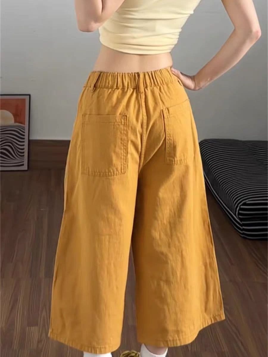 아메리칸 패치워크 만화 알파벳 황색 청바지 여성 여름 몸매 가꾸기 슬림해 보이는 워싱 주머니 디자인 센스 7부 바지 이미지 2