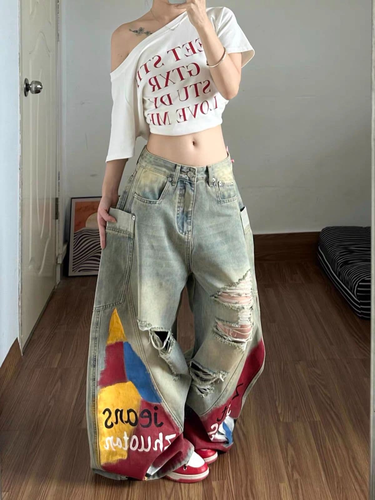 레트로 색상 블록 낙서 찢어진 부분 모통이 칼 청바지 바지 여자 2026 가을 새로운 측면 주머니 바닥 청소 바지 상세 이미지 4