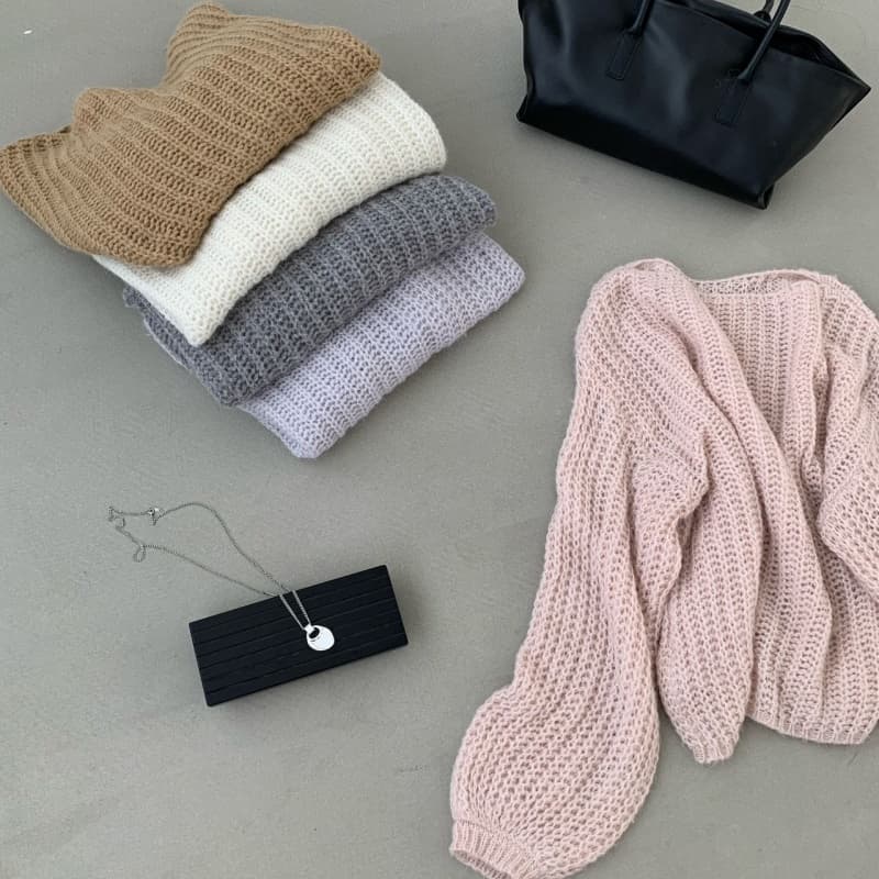느긋한 부드러운 바람 라운드 넥 홀로우 아웃 긴팔 니트 스웨터 여자 2026 가을 한 맛 케이지 소매 혼합 색상 느긋한 큰 스웨터 상세 이미지 2