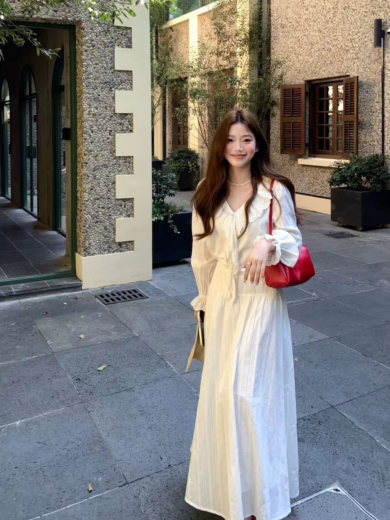 란 란 독점적 인 향기로운 백주 로맨스 한 부서 높음 지혜 부드러운 품격 절묘한 맨위 길이 반 스커트 세트 상세 이미지 2