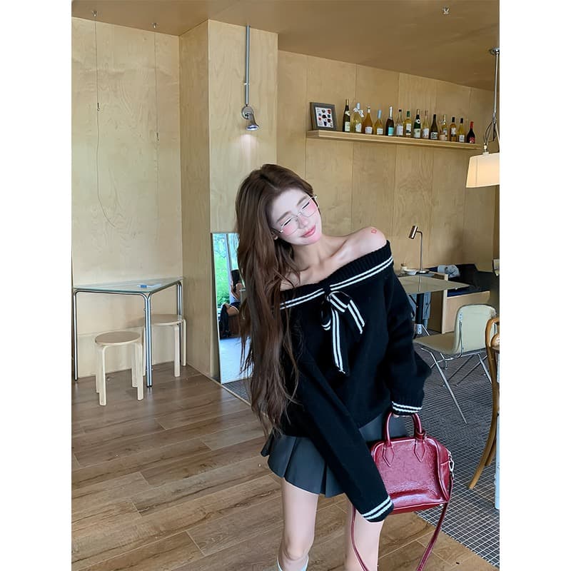 가을 2026 새로운 여성 검정색 오프숄더 자이언트 잘 생긴 오프숄더 디자인 센스 맨위 이미지 2