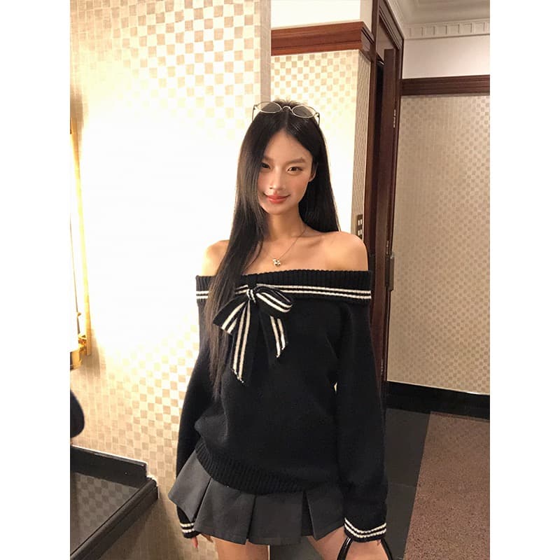 가을 2026 새로운 여성 검정색 오프숄더 자이언트 잘 생긴 오프숄더 디자인 센스 맨위 이미지 4
