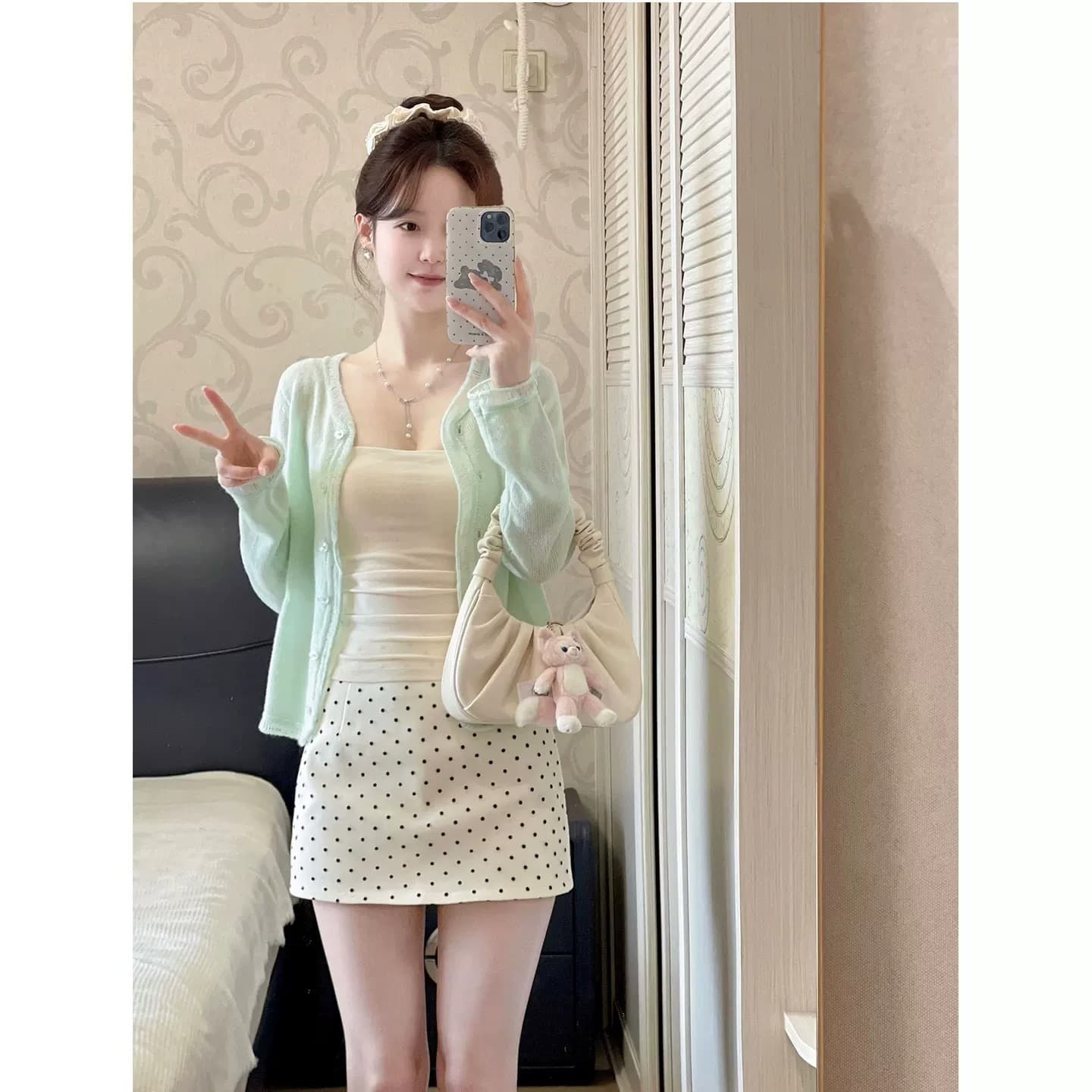 녹색 라운드 넥 스웨터 여자 이른 봄 새로운 한 부서 분위기 센스 착용 가져 가라. 느긋한 바람 작은 키 쇼트 스타일 니트 오픈 가디건