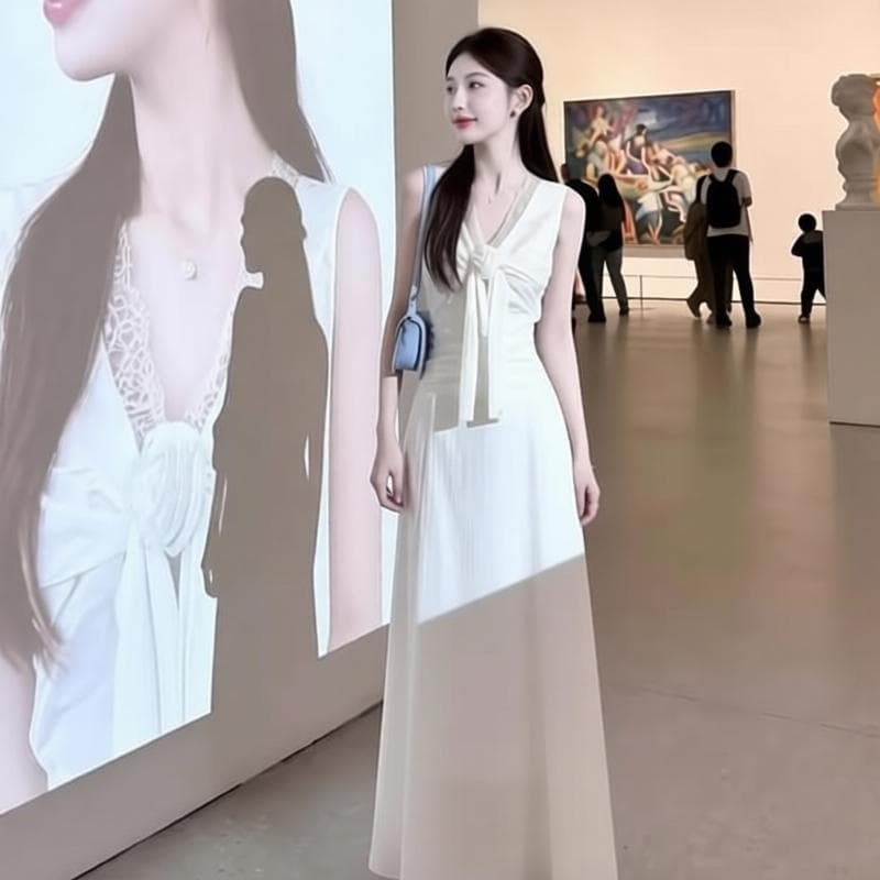 프랑스식 V넥 레이스 조각 민소매 여성 드레스 2026 여름 화이트 허리 수축 슬림해 보이는 품격 길다 치마 트렌디 상세 이미지 3