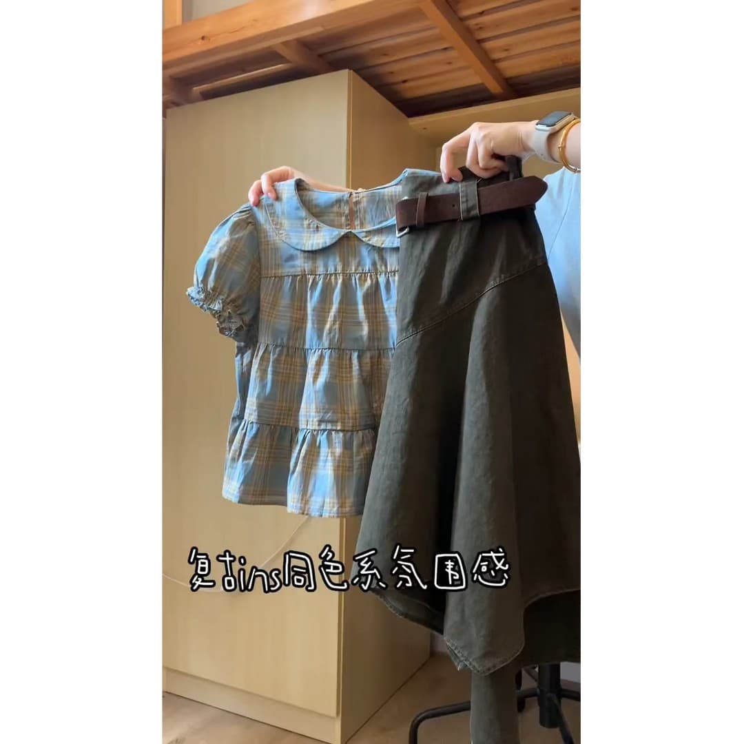 정가 재고 있음 한 부서 연령 감소 바람 베이비 칼라 여성 셔츠 여름 디자인 센스 불규칙 반신 치마 세트 이미지 3