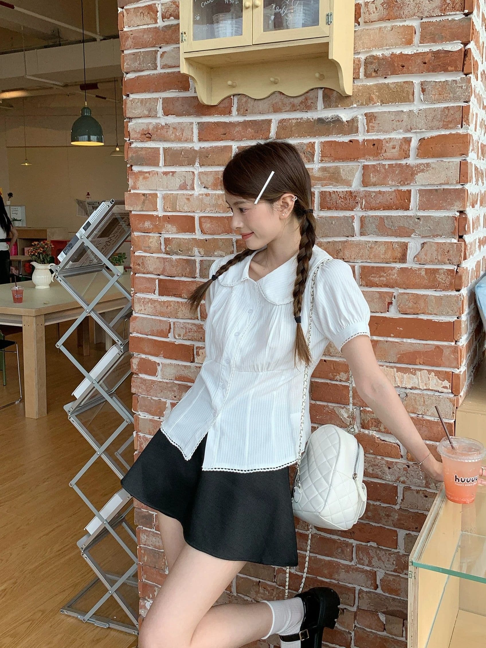 여름 새로운 한 부서 품격 학원 스타일 베이비 칼라 화이트 거품 소매 셔츠 플리츠 스커트 여성 연령 감소 상세 이미지 12