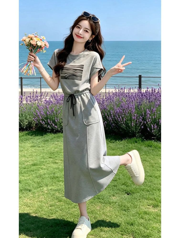 차가운 실크 코튼 2026 여름 새로운 패션 캐주얼 스포츠 슈트 여성 외국 가스 반팔 반신 스커트 투피스 세트 트렌디 상세 이미지 5