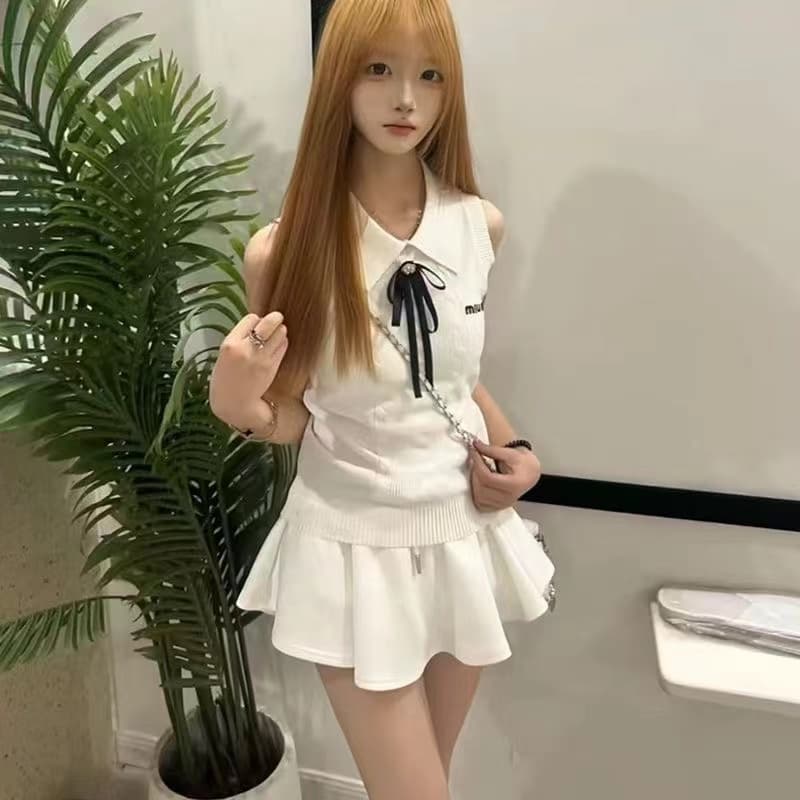 lym studio 화이트 니트 폴로 칼라 조끼 여성 민소매 몸매 가꾸기 출퇴근 외출용 고급 센스 맨위 이미지 4