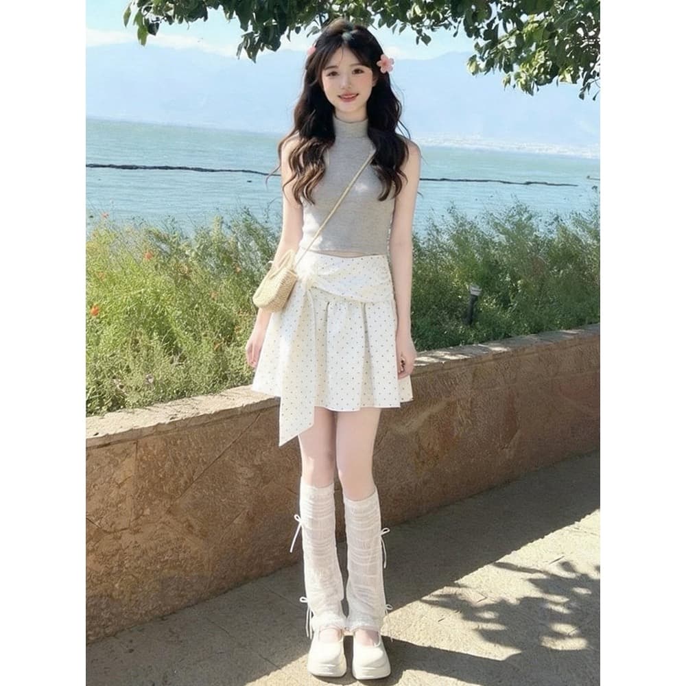 miu 부서 불규칙 도트 무늬 반신 스커트 여성 2026 여름 새로운 레이스업 슬림해 보이는 표지 넓적 다리 한 마디 미니 스커트 플리츠 스커트 이미지 3