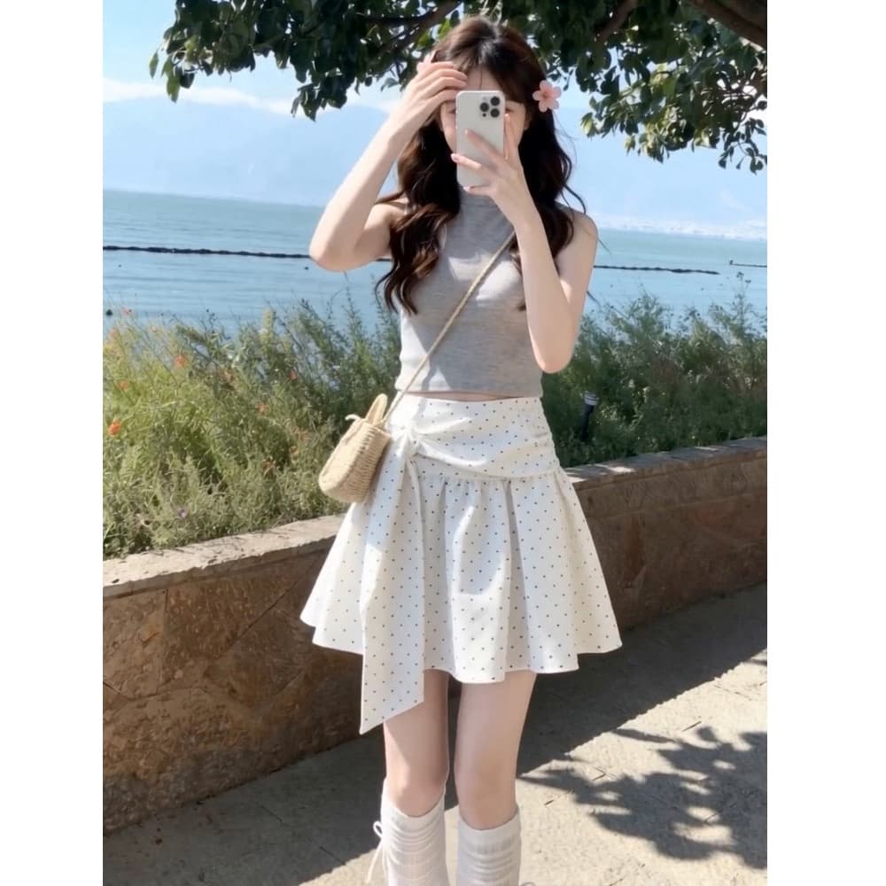 miu 부서 불규칙 도트 무늬 반신 스커트 여성 2026 여름 새로운 레이스업 슬림해 보이는 표지 넓적 다리 한 마디 미니 스커트 플리츠 스커트 상세 이미지 5