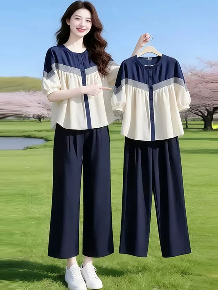 패션 세트 여성 2026 여름 새로운 세련된 외국 가스 표지 배 슬림해 보이는 루즈핏 셔츠 와이드 레그 팬츠 투피스 세트 상세 이미지 1