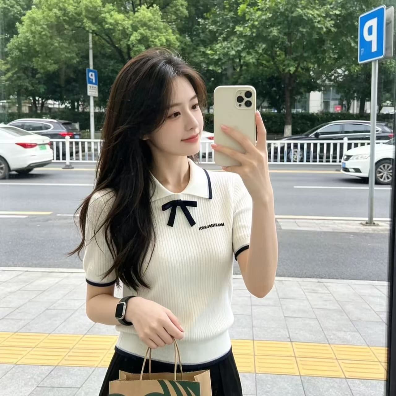 한 부서 학원 스타일 나비 매듭 니트 스웨터 2026 여름 새로운 흑인과 백인 배색 폴로 칼라 몸매 가꾸기 반팔 맨위 여성 이미지 5