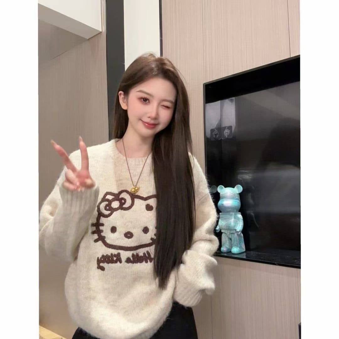 레트로 만화 고양이 자카드 디자인 센스 라운드 넥 스웨터 여자 가을 겨울 새로운 부드러운 찹쌀 루즈핏 연령 감소 니트 스웨터 트렌디