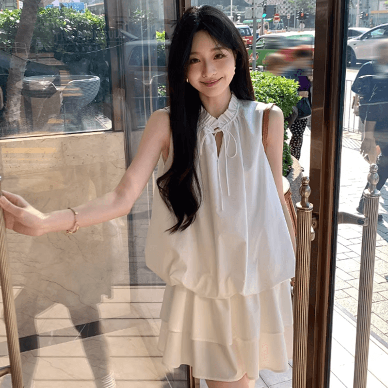 부드러운 바람 V넥 레이스업 황색 꽃밭 여성 드레스 새로운 다용도 슬림해 보이는 한 마디 민소매 미니 스커트 반바지 세트