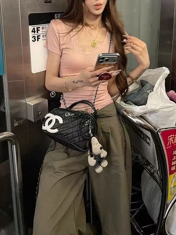 새로운 한국 스타일 핫걸 바람 몸매 가꾸기 반팔 맨위 하이웨이스트 루즈핏 워크웨어 팬츠 캐주얼 두 조각 여성 세트 트렌디 이미지 3