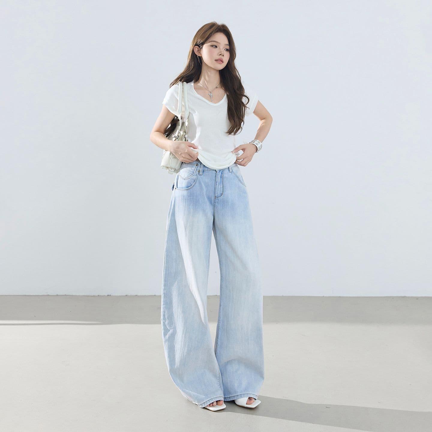 아메리칸 레트로 하이웨이스트 루즈핏 와이드 레그 팬츠 이후 부서 버클 디자인 센스 수 있습니다. 조정 모통이 칼 바지 청바지 여성 이미지 2