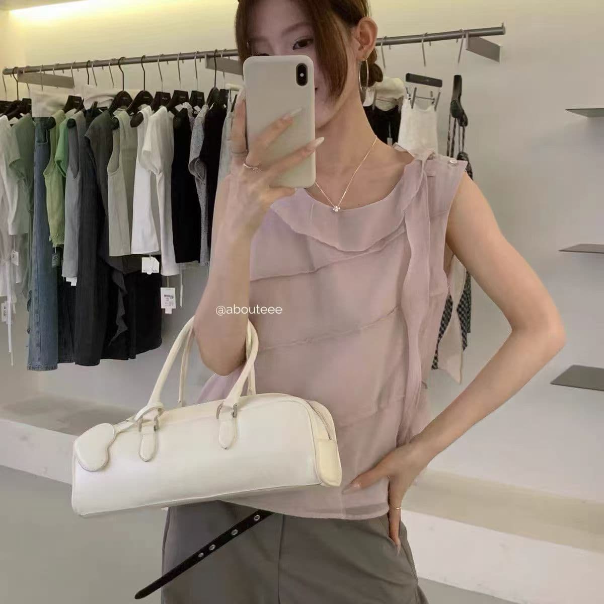 여름 출퇴근 몸매 가꾸기 슬림해 보이는 디자인 센스 조끼 민소매 미니멀리즘 비스듬한 기사 불규칙 리본 맨위 여성 이미지 3