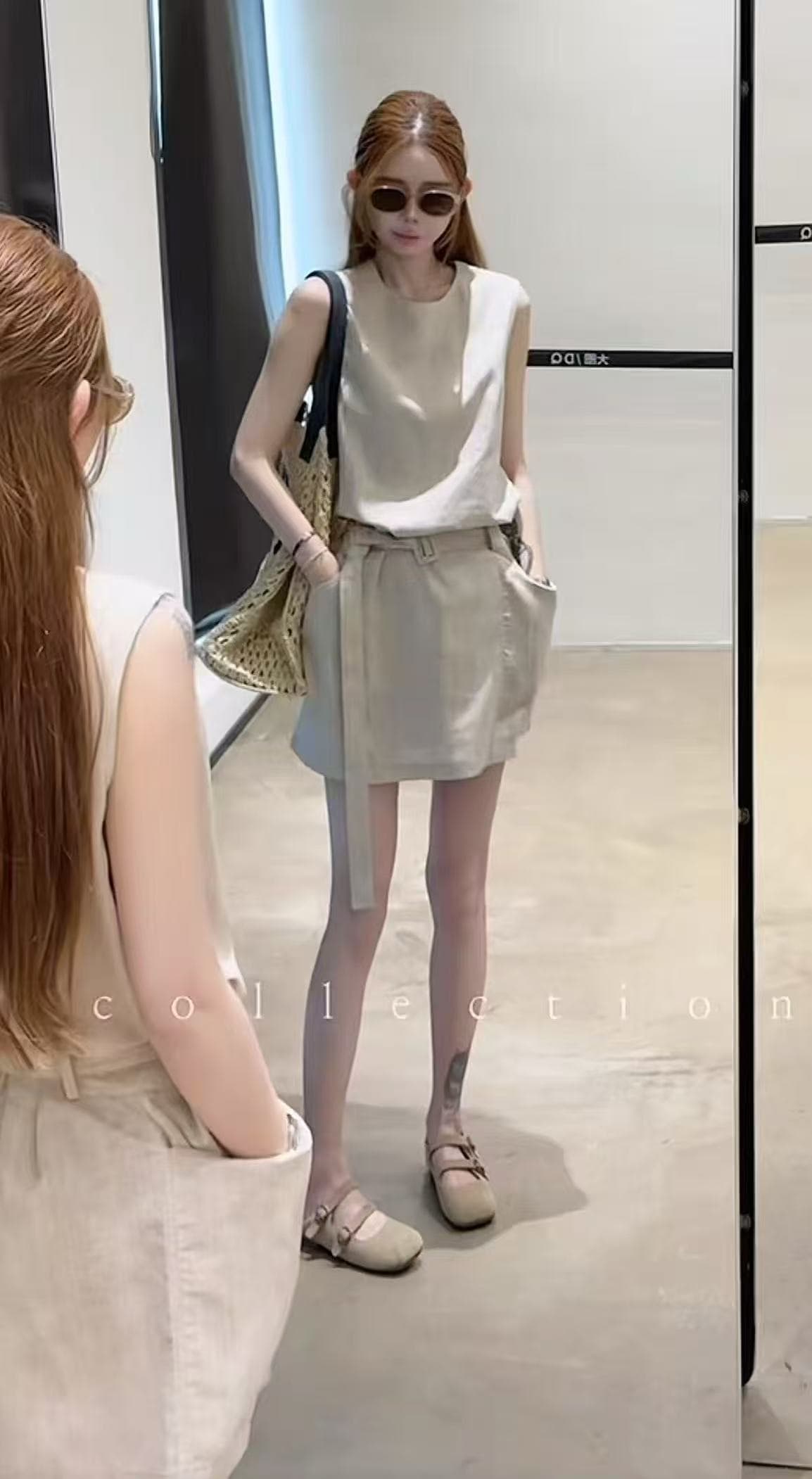 미니멀리즘 바람 베이지 색 민소매 여성 드레스 2026 여름 새로운 이미지 2