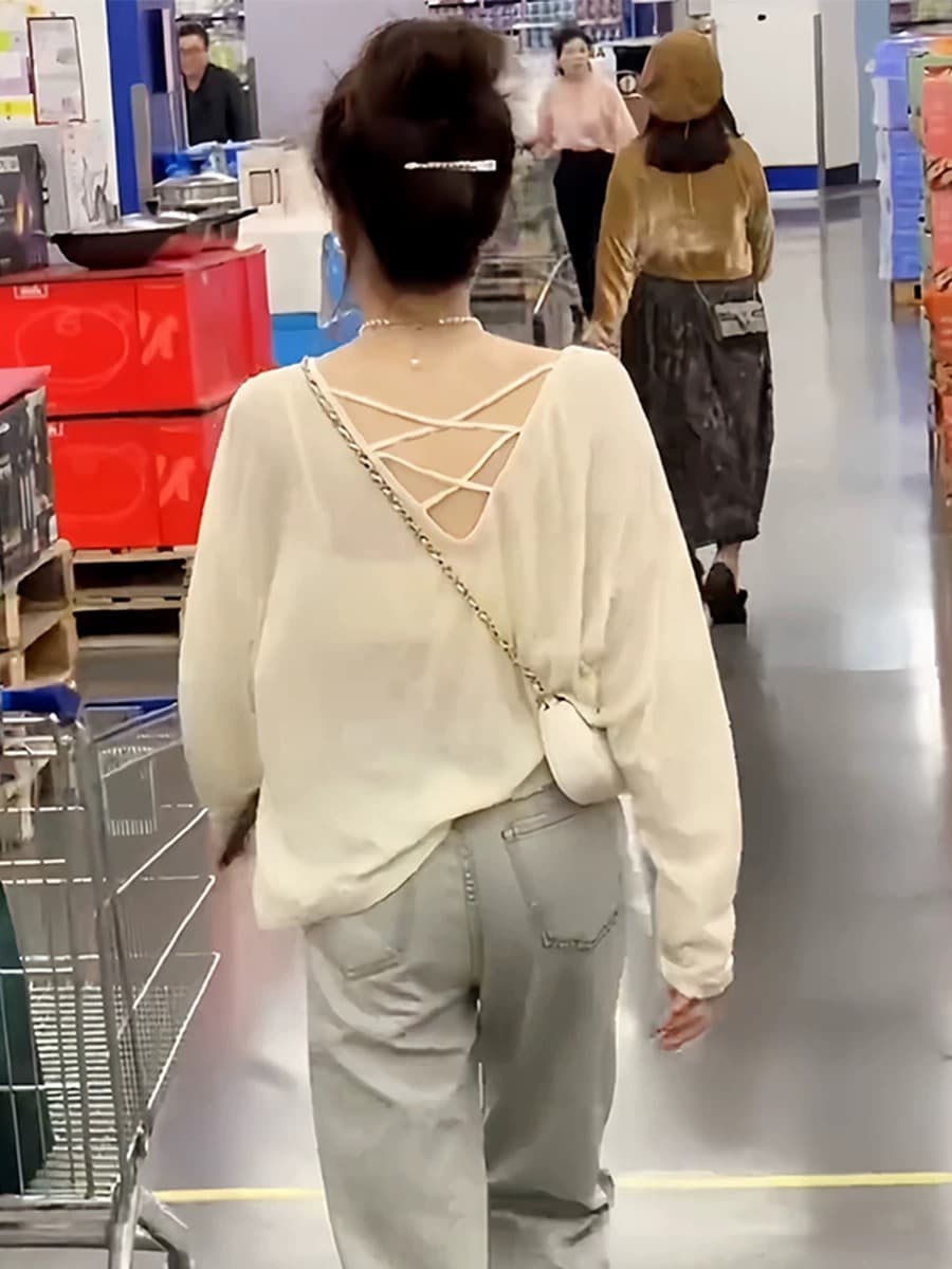 뒤로 홀로우 아웃 디자인 센스 Tulle 긴팔 티셔츠 니트 맨위 여성 여름 새로운 루즈핏 자외선 차단 블라우스 외출용
