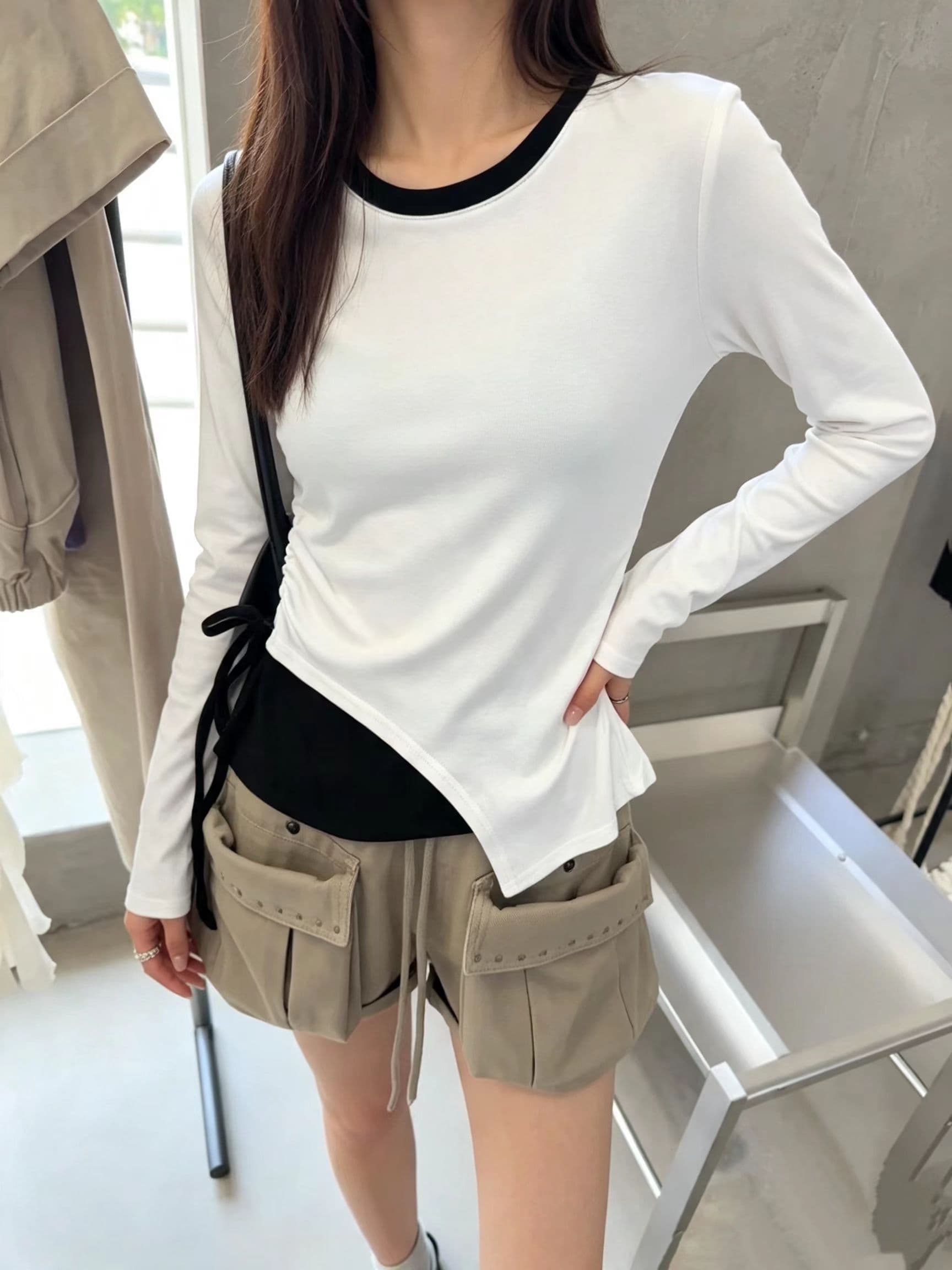 슈퍼 잘 생긴 배색 패치워크 페이크 레이어드 라운드 넥 긴팔 티셔츠 여성 2026 가을 새로운 고급 센스 맨위