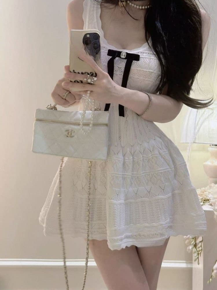 사랑 여름 작은 흰색 꽃 하얀 달빛 부드러운 한 부서 순수한 욕망 바람 한 부서 나비 매듭 슬림해 보이는 조끼 여성 드레스 이미지 2