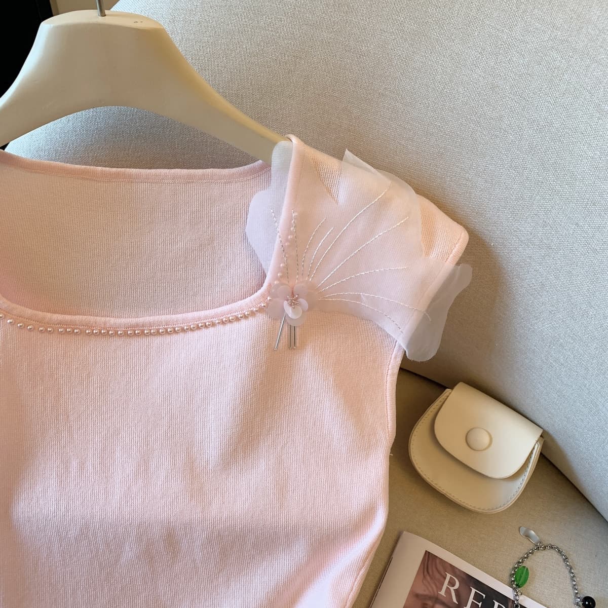 실사 프랑스식 우아함 민소매 니트 티셔츠 여성 2026 여름 새로운 미니멀리즘 허리 수축 쇼트 스타일 디자인 센스 맨위 상세 이미지 5