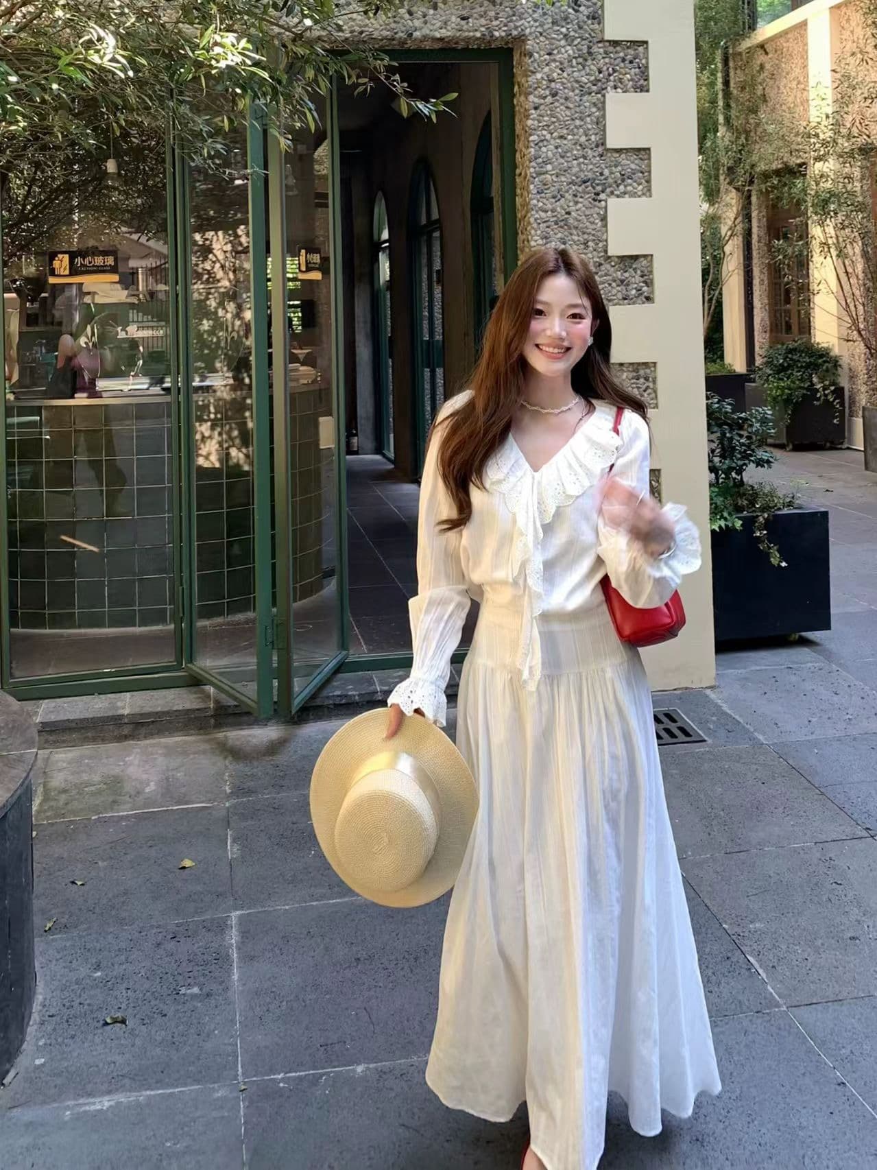 란 란 독점적 인 향기로운 백주 로맨스 한 부서 높음 지혜 부드러운 품격 절묘한 맨위 길이 반 스커트 세트 상세 이미지 3