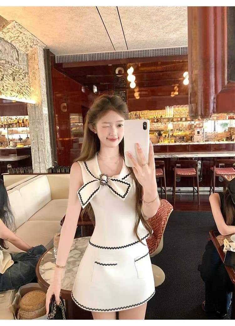작은 샤넬 스타일 나비 매듭 민소매 맨위 한 마디 반신 스커트 투피스 슈트