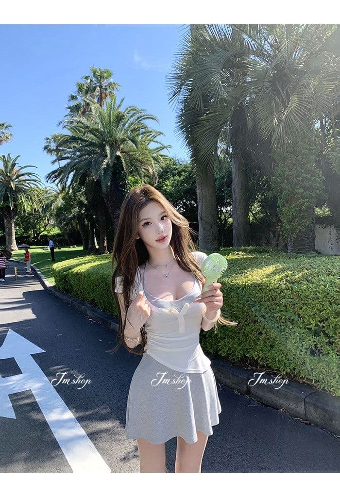 양모 대 u 칼라 비스듬한 진자 허리 수축 핫걸 단추 티셔츠 순수한 욕망 행침 목 니트 슬립 플리츠 스커트 여름 투피스 세트 상세 이미지 8