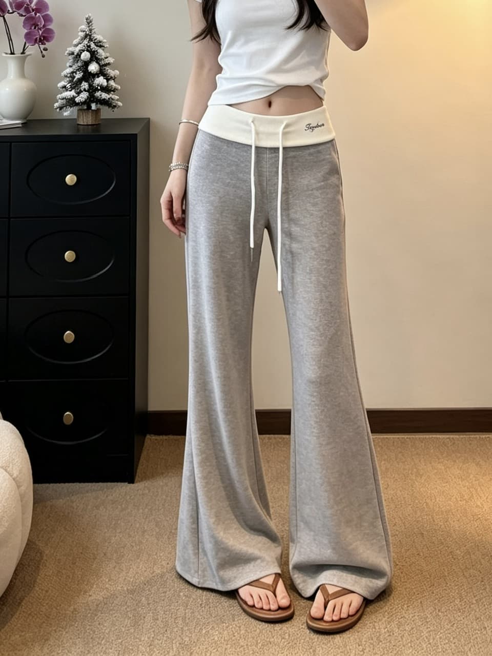 정가 실사 느긋한 바람 펌프 로프 부츠컷 바지 여성 배색 패치워크 허리 머리 디자인 센스 슬림해 보이는 캐주얼 긴 바지