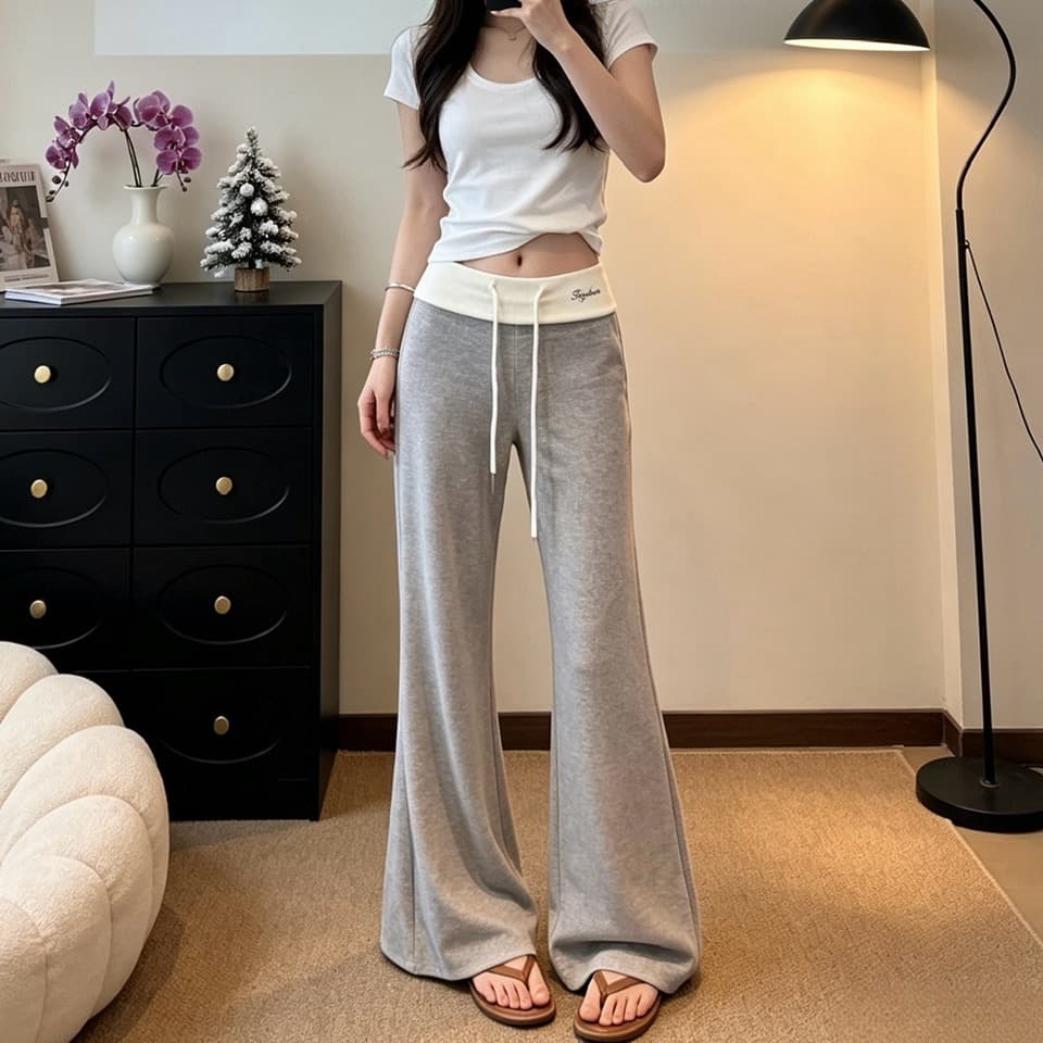 정가 실사 느긋한 바람 펌프 로프 부츠컷 바지 여성 배색 패치워크 허리 머리 디자인 센스 슬림해 보이는 캐주얼 긴 바지 이미지 5