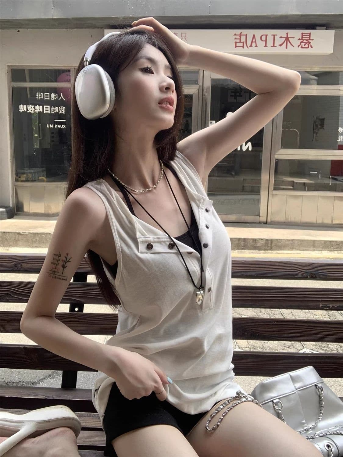 원본 이미지 원본 원단 느긋한 바람 단추 민소매 슬립 여성 조끼 화이트 몸매 가꾸기 중간 길이 상세 이미지 10