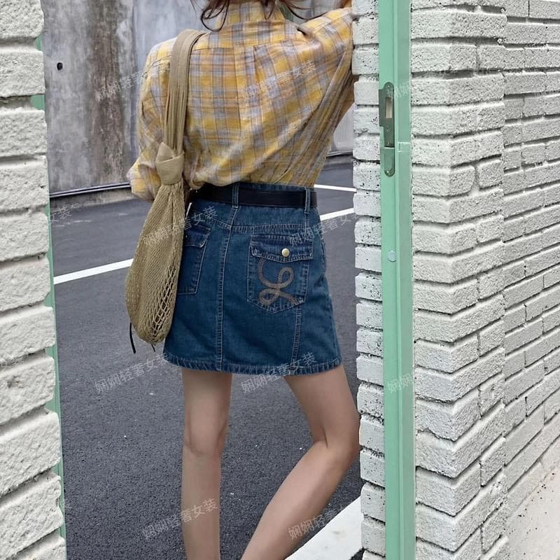 2026 여름 새로운 데님 미니 스커트 하이웨이스트 슬림해 보이는 표지 넓적 다리 노출 방지 한 마디 데님 반신 스커트 여성 빅 사이즈 이미지 3