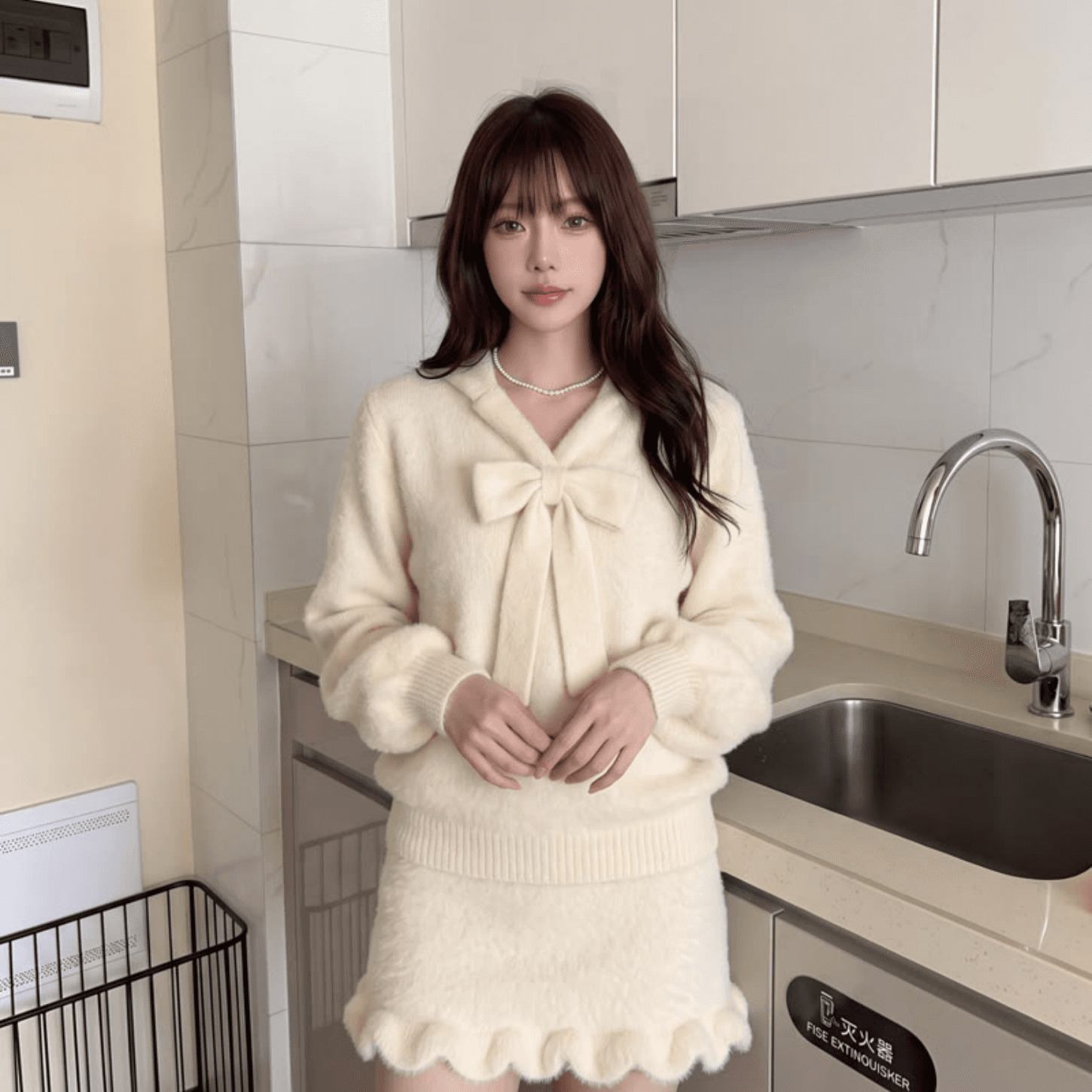 프랑스식 달콤함 나비 매듭 스웨터 미니 스커트 세트 여성 가을 작은 키 슬림해 보이는 느긋한 일상 착용 가져 가라. 투피스 세트 상세 이미지 3