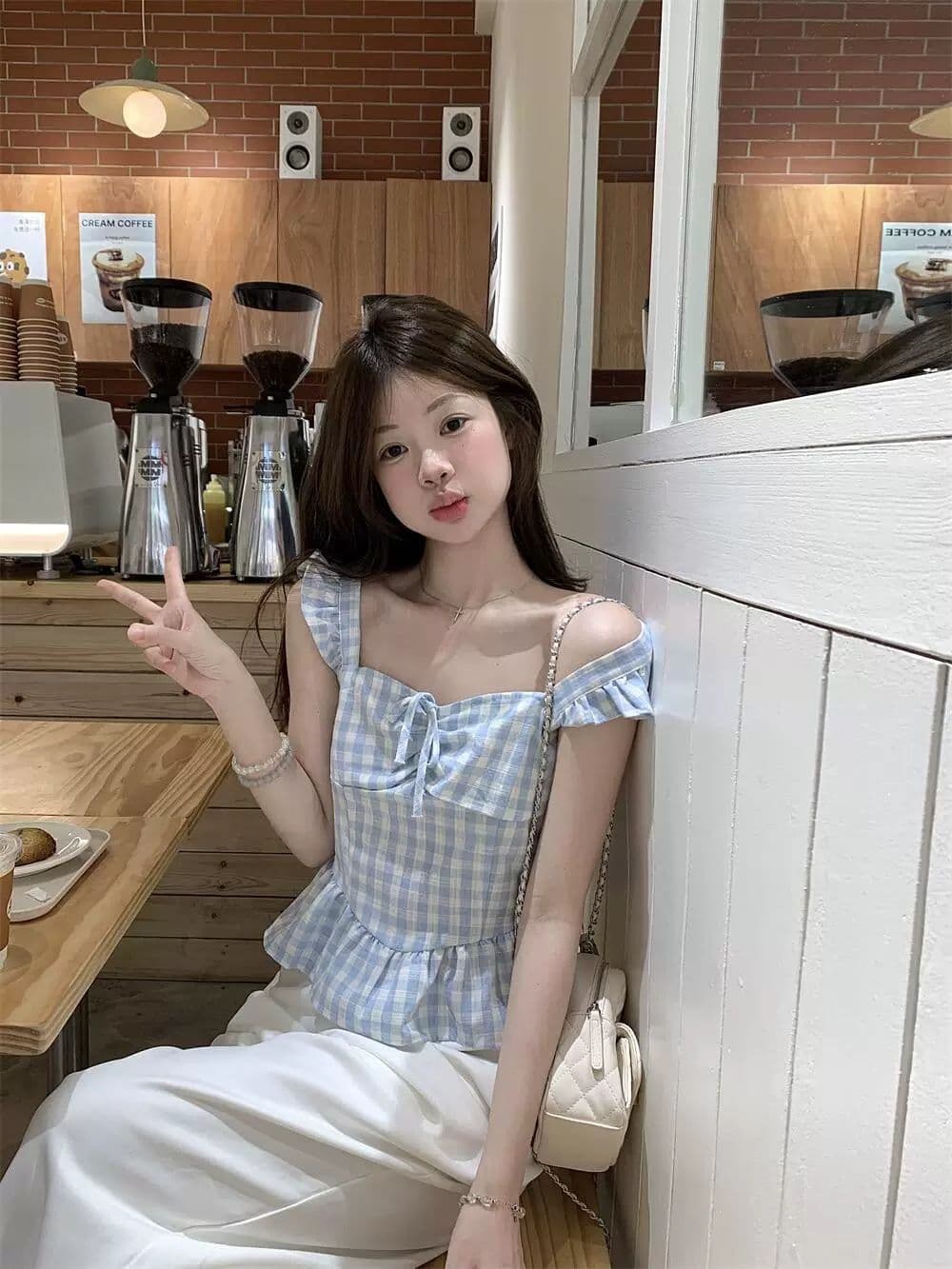 파란색 체크무늬 작은 날다 소매 조끼 2026 여름 새로운 레이스업 순수한 욕망 바람 프릴 몸매 가꾸기 슬림해 보이는 맨위 이미지 3