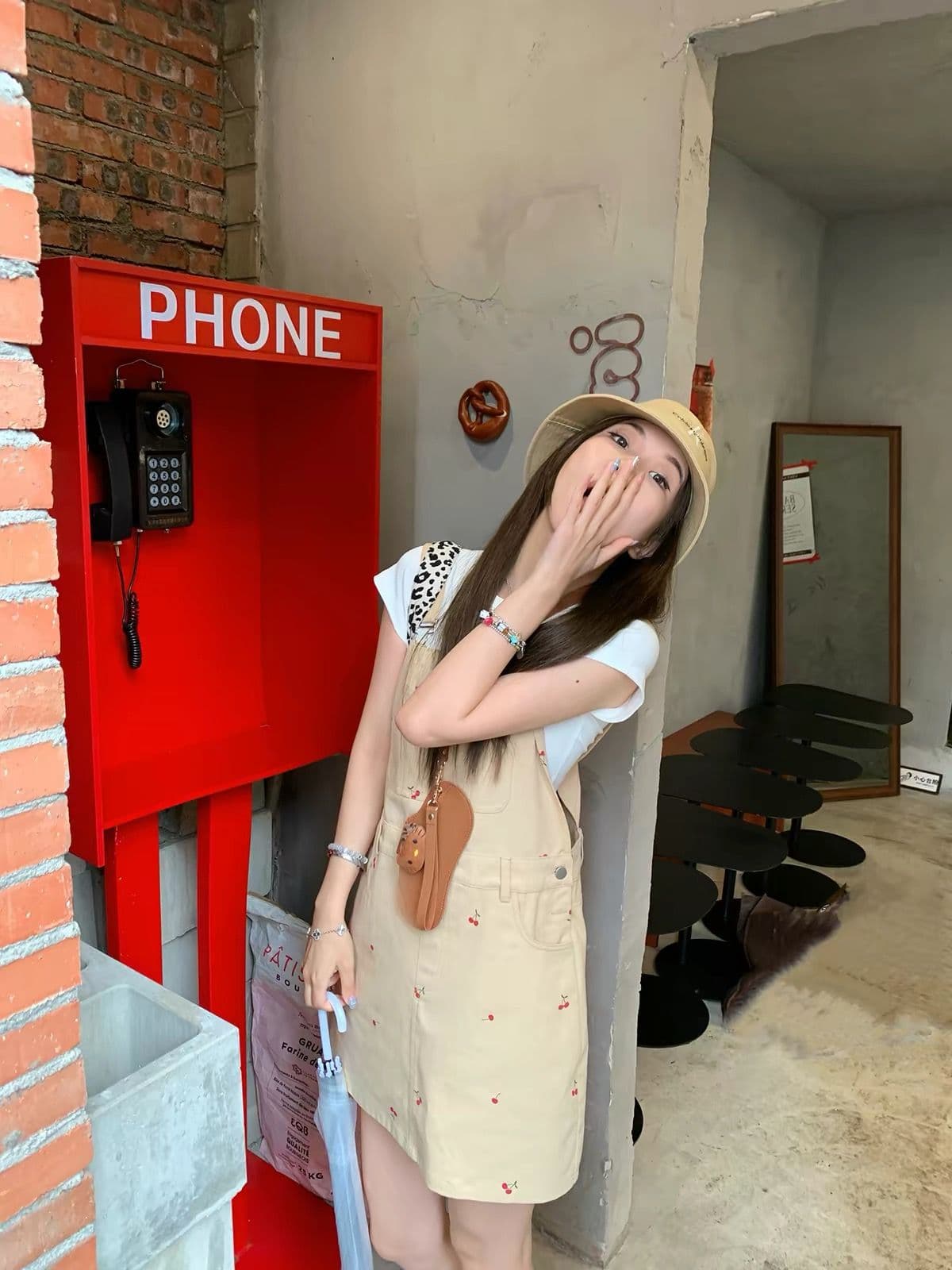 체리 눈 얼음 카키 색 멜빵 스커트 봄 여름 한 부서 연령 감소 슬림해 보이는 캐주얼 미니 스커트 여성 이미지 4