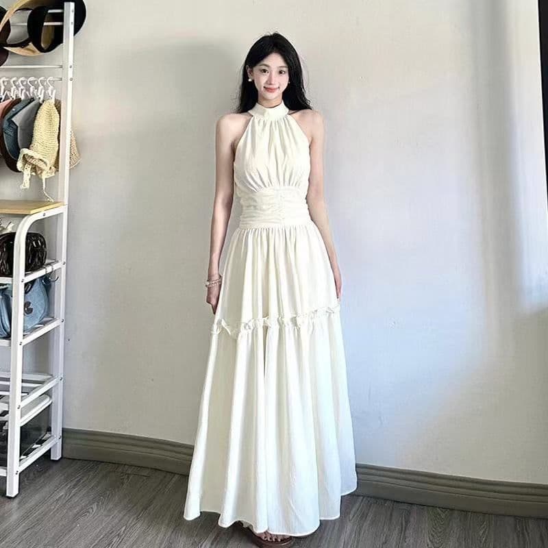 해변가 휴가 바람 화이트 민소매 행침 목 여성 드레스 2026 여름 디자인 센스 허리 수축 슬림해 보이는 품격 롱 스커트 이미지 4
