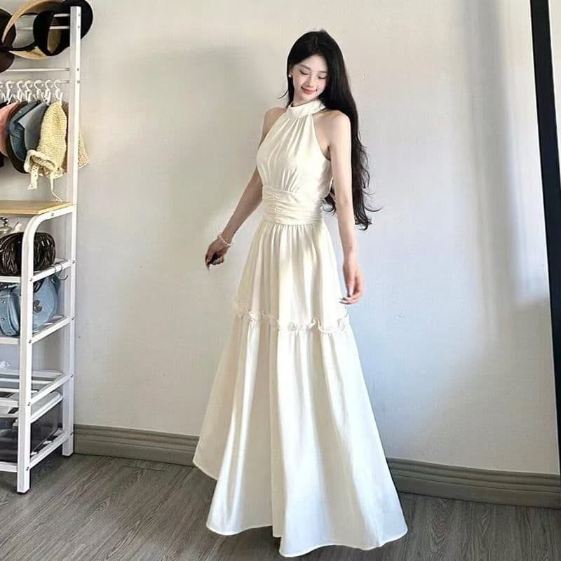 해변가 휴가 바람 화이트 민소매 행침 목 여성 드레스 2026 여름 디자인 센스 허리 수축 슬림해 보이는 품격 롱 스커트 이미지 3