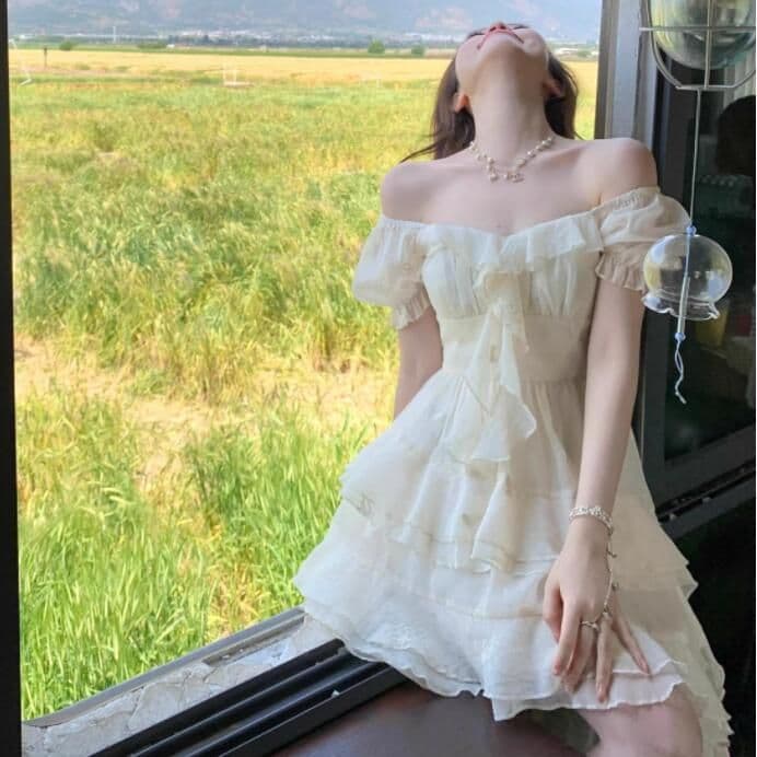 여름 한국 스타일 새로운 요정 바람 휴가 불규칙 치마 품격 슬림해 보이는 앞이 짧고 뒤가 길다 드레스 미니 스커트 여성 요정 이미지 3