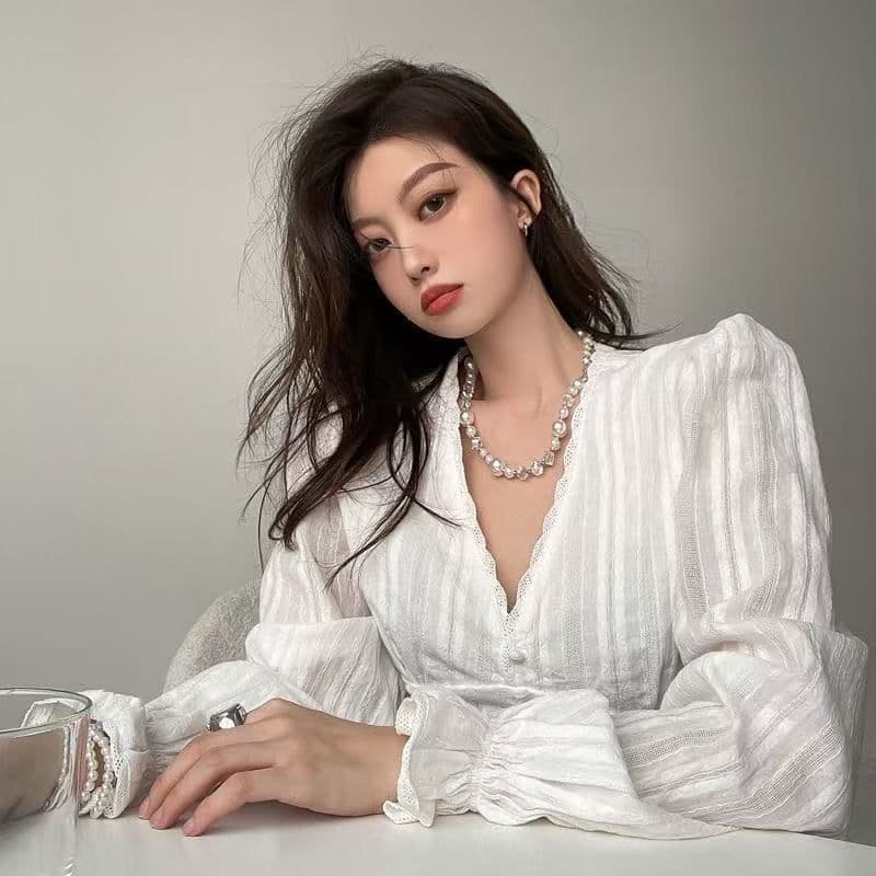 이른 봄 새로운 마이크로 지방 mm 맨위 쇼트 스타일 외국 가스 펌프 로프 슈퍼 요정 프랑스식 맨위 슬림해 보이는 긴팔 V넥 여성 셔츠 상세 이미지 5