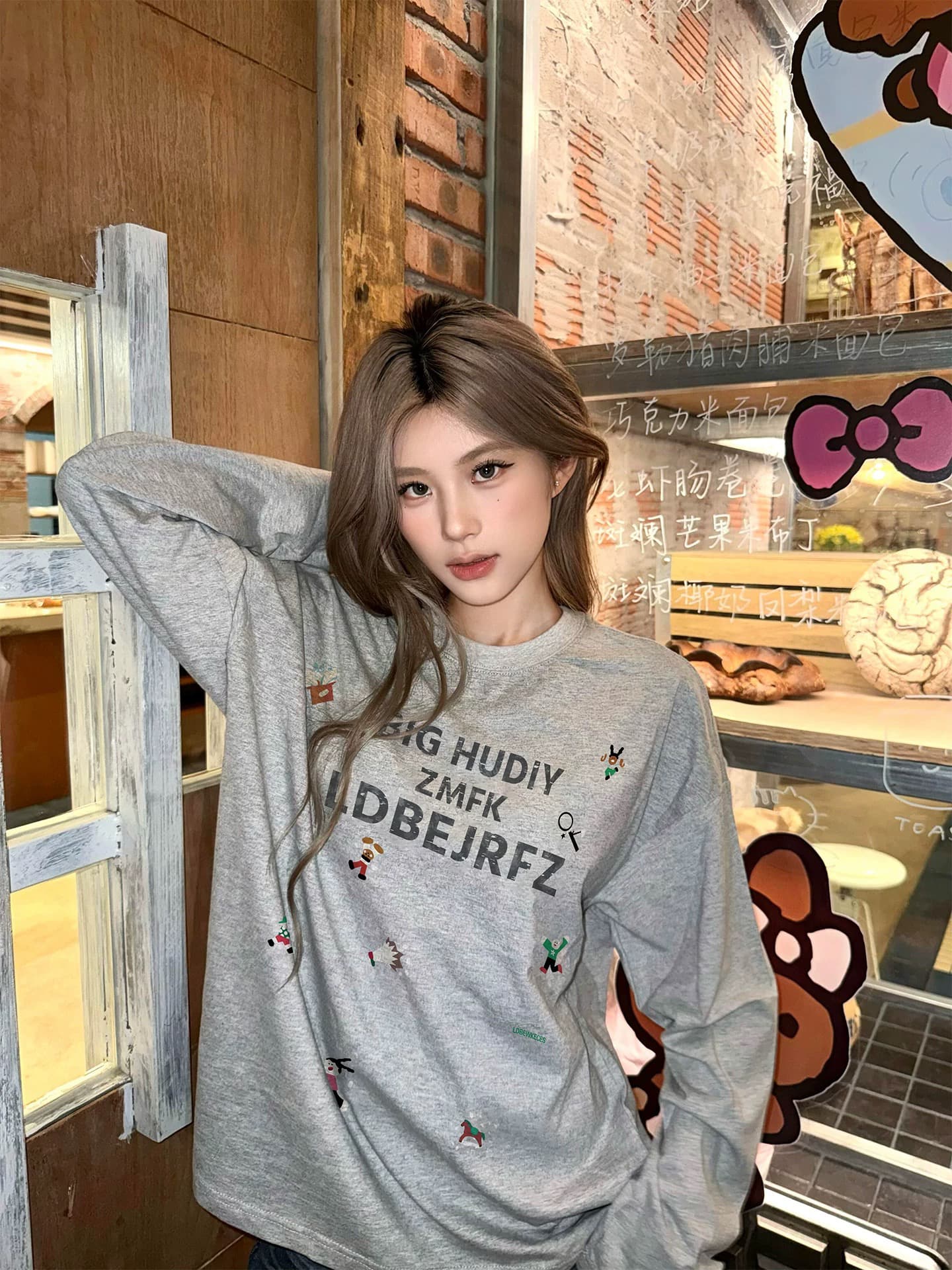 회색 긴팔 티셔츠 여성 봄 가을 2026 새로운 아메리칸 레트로 루즈핏 라운드 넥 느긋한 바람 맨위 기본 셔츠 한 상세 이미지 1