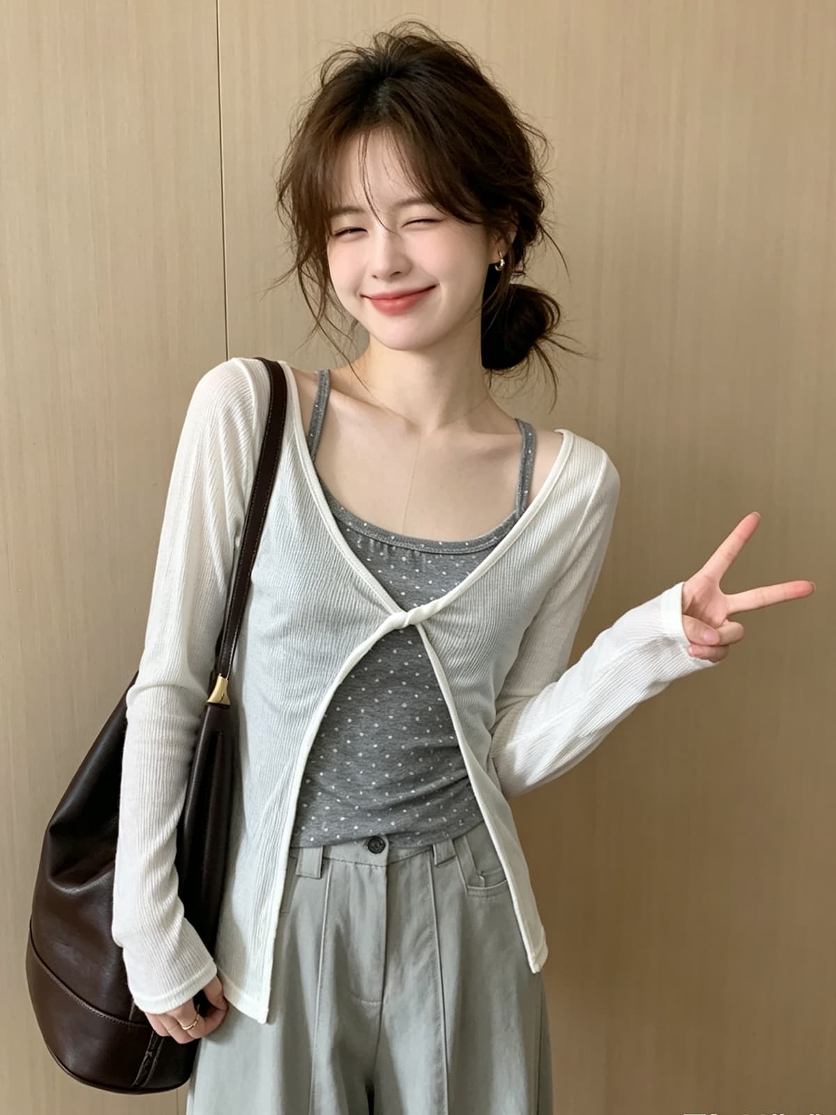 미니멀리즘 소녀 바람 디자인 센스 나비 매듭 니트 슬립 여성 여름 새로운 루즈핏 다용도 긴팔 자외선 차단 블라우스 이미지 2